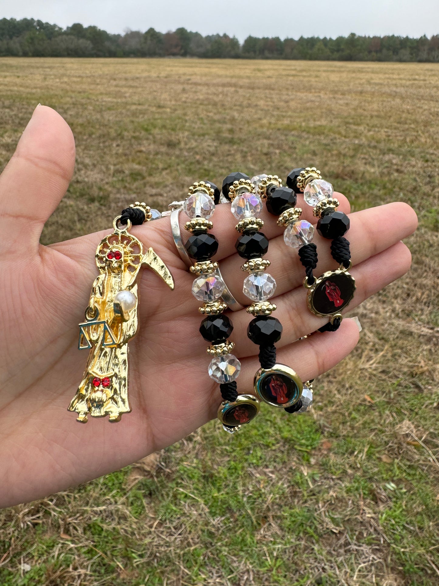 Santa Muerte Black with clear Rosary